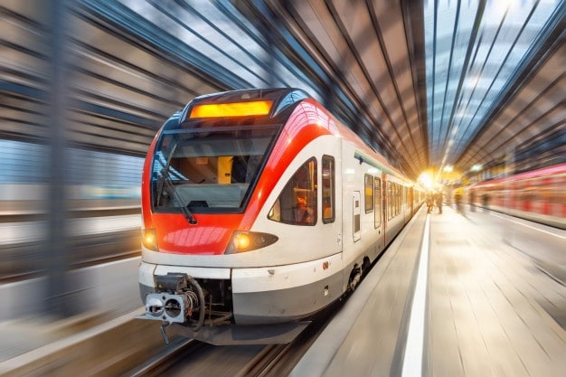 passenger-high-speed-train-with-motion-blur-station_165577-59