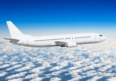 passenger-white-airplane-side-view-flies-flight-level-sky_165577-531